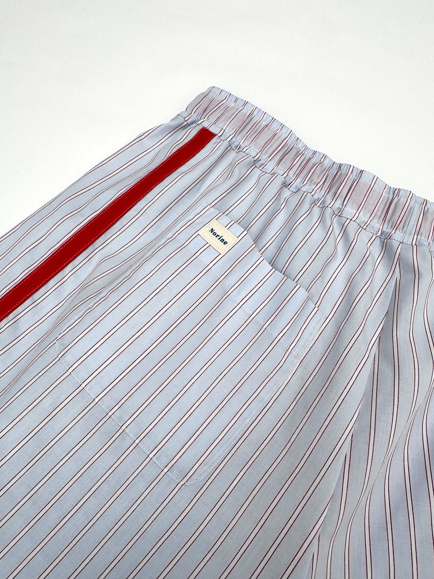 SANDRA SHORT - LIGHTBLUE & RED - MAAT 2